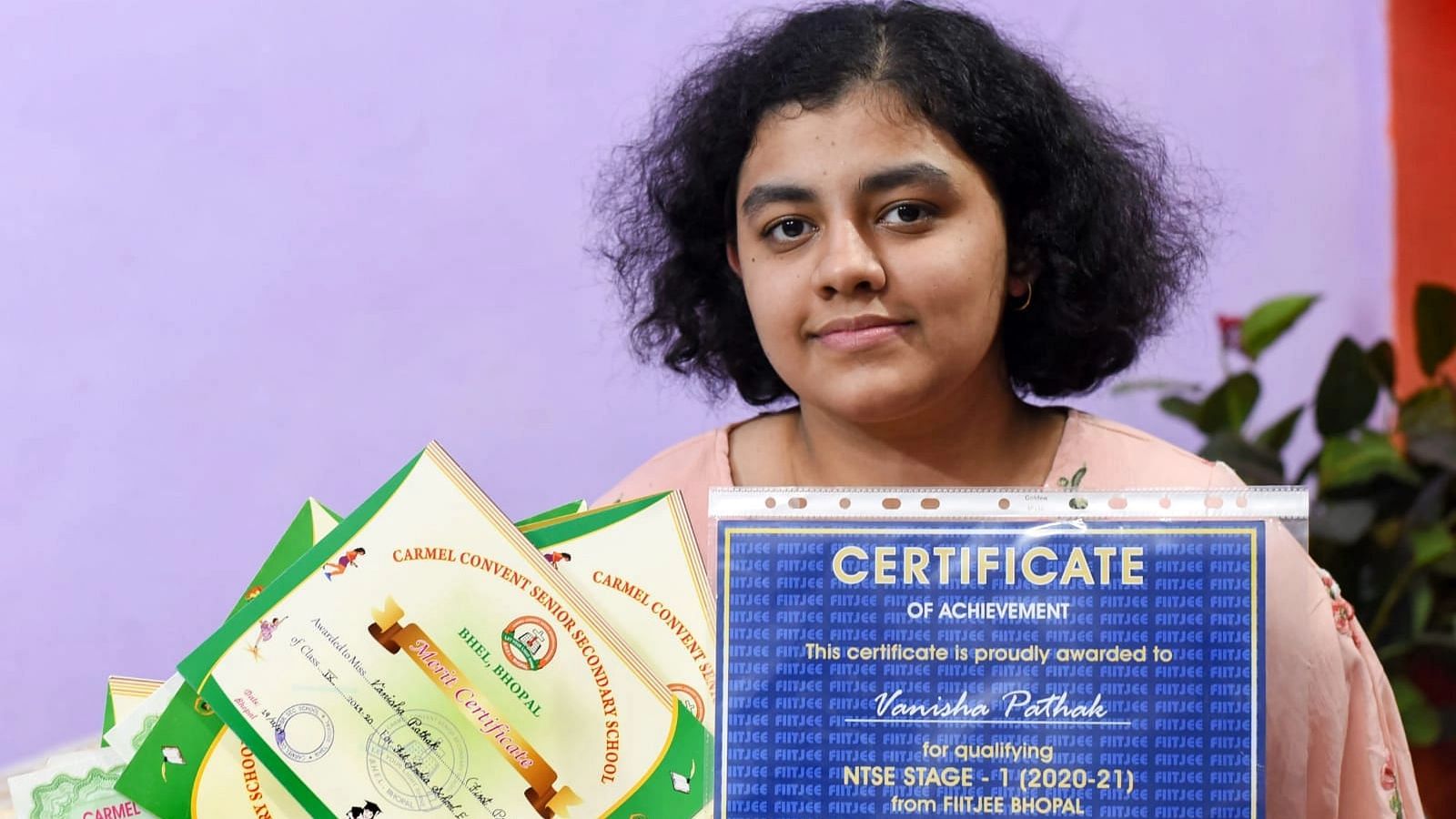 <div class="paragraphs"><p>A 16-year-old Bhopal girl, who has topped Class X CBSE exams with lofty scores in all subjects, reels from the recent loss of both her parents to COVID-19 even as those around her celebrate her achievement.</p></div>