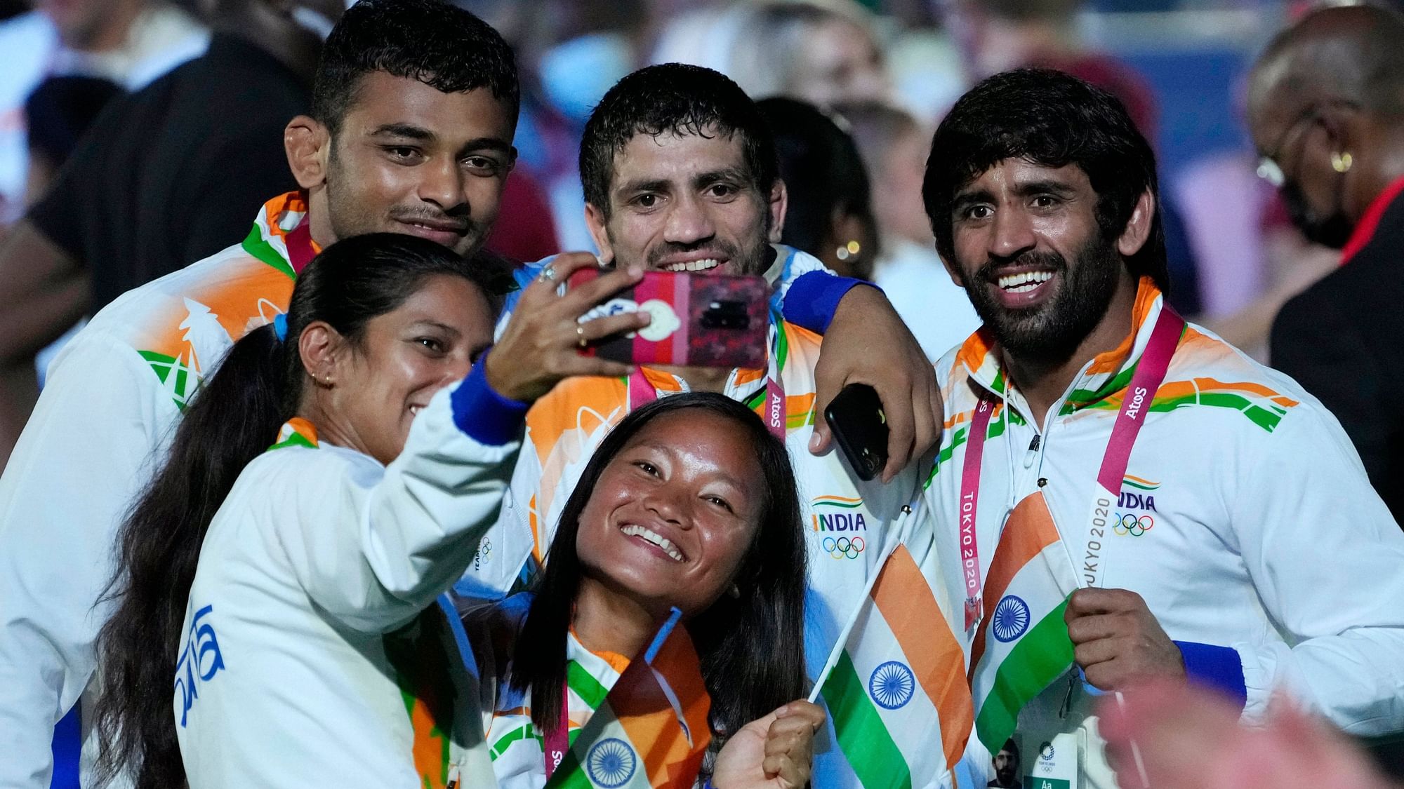 <div class="paragraphs"><p>Indian Olympians during the closing ceremony in Tokyo on Sunday</p></div>