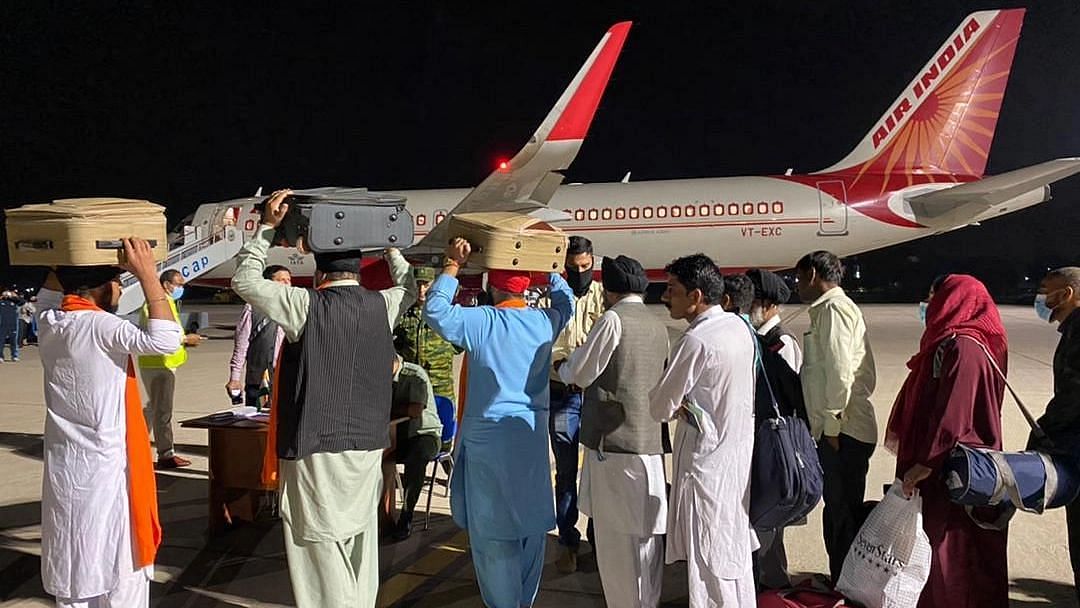 <div class="paragraphs"><p>The Union Health Ministry announced, on Tuesday, 24 August, that all people evacuated from Afghanistan will have to undergo a mandatory 14-day institutional quarantine at Delhi's ITBP Chhawla Camp. Image of people arriving from Afghanistan used for representation purposes.<br></p></div>