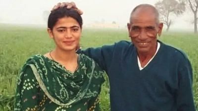Savita Poonia with grandfather Ranjitram Poonia.