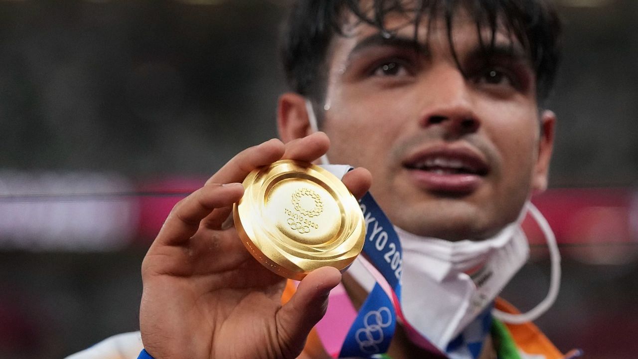 <div class="paragraphs"><p>Neeraj Chopra shows off his Gold medal.&nbsp;</p></div>