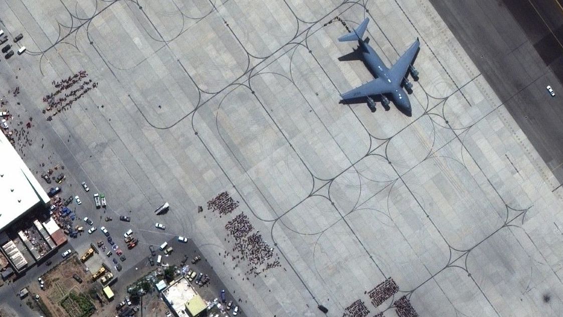 <div class="paragraphs"><p>In this satellite photo released by Maxar Technologies, Kabul's international airport is seen amid evacuations on Monday, 23 August.</p></div>