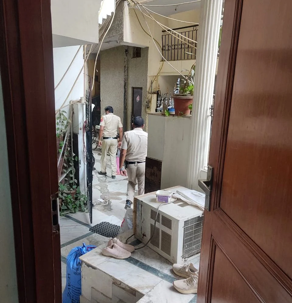 <div class="paragraphs"><p>The two policemen who came looking for the accused.</p></div>