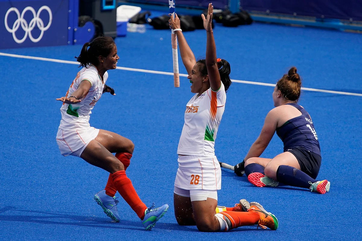 <div class="paragraphs"><p>India forward Vandana Katariya, left, runs to embrace forward Rani after their team scored against Ireland during the 2020 Tokyo Olympics.</p></div>