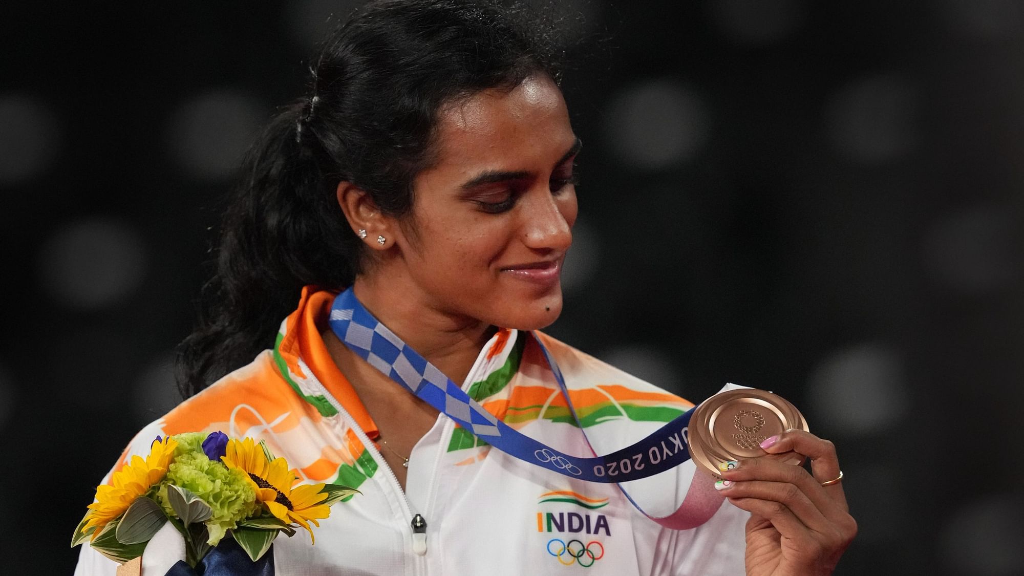 <div class="paragraphs"><p>PV Sindhu with the Bronze medal at the Tokyo Olympics</p></div>