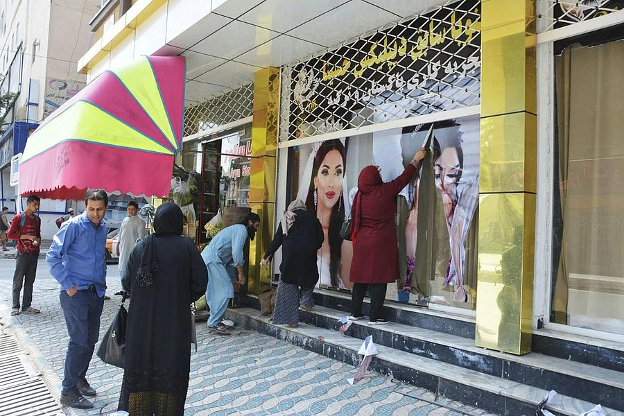 <div class="paragraphs"><p>Beauty salons covering up women's pictures in Afghanistan.</p></div>