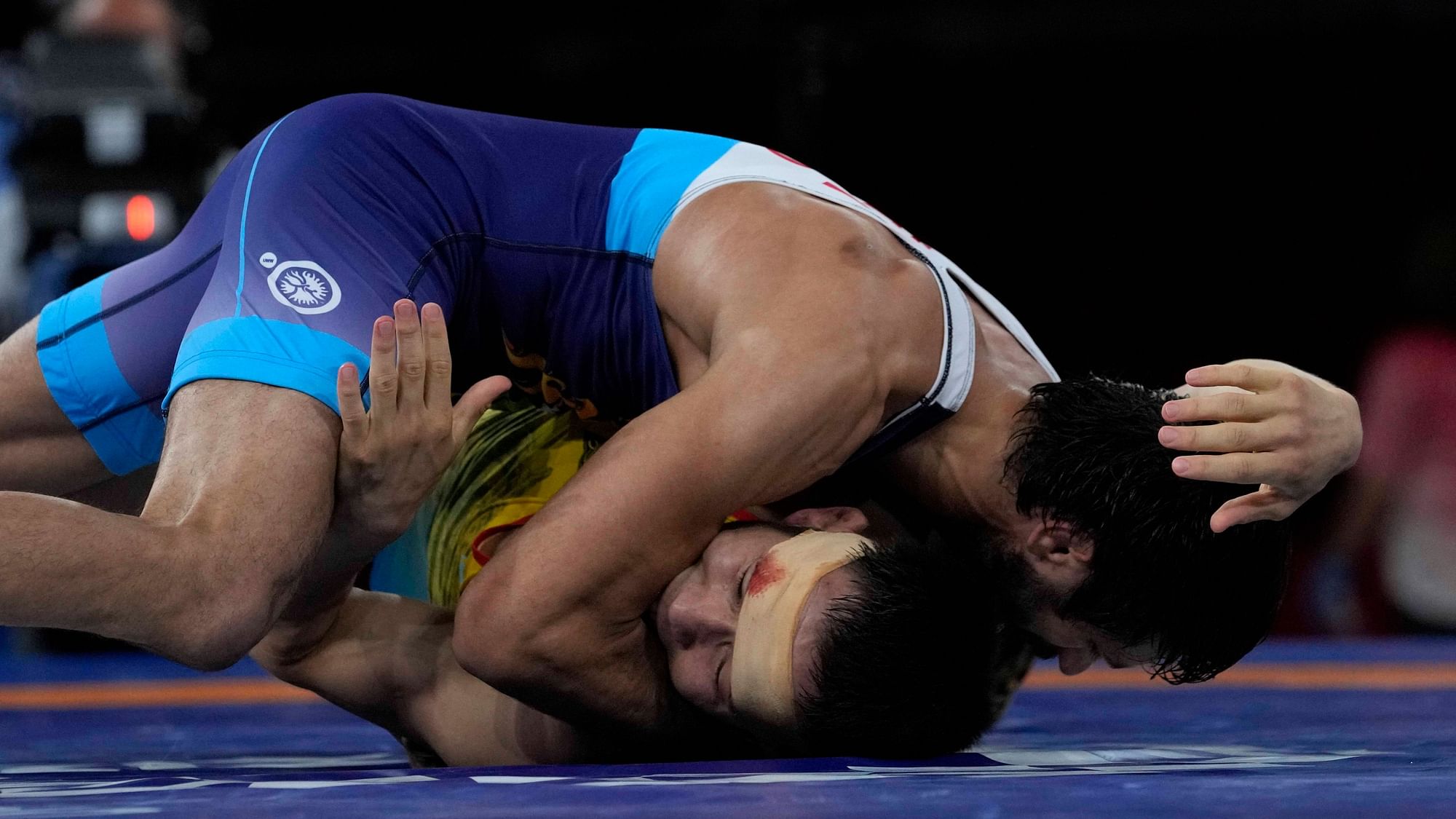 <div class="paragraphs"><p>Ravi Kumar Dahiya (in blue) will contest in the wrestling final in the 57kg category at Tokyo Olympics&nbsp;</p></div>
