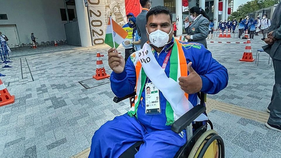<div class="paragraphs"><p>Tokyo: Javelin thrower Tek Chand poses as flagbearer of the Indian contingent for the opening ceremony in Tokyo 2020 Paralympic Games.</p></div>
