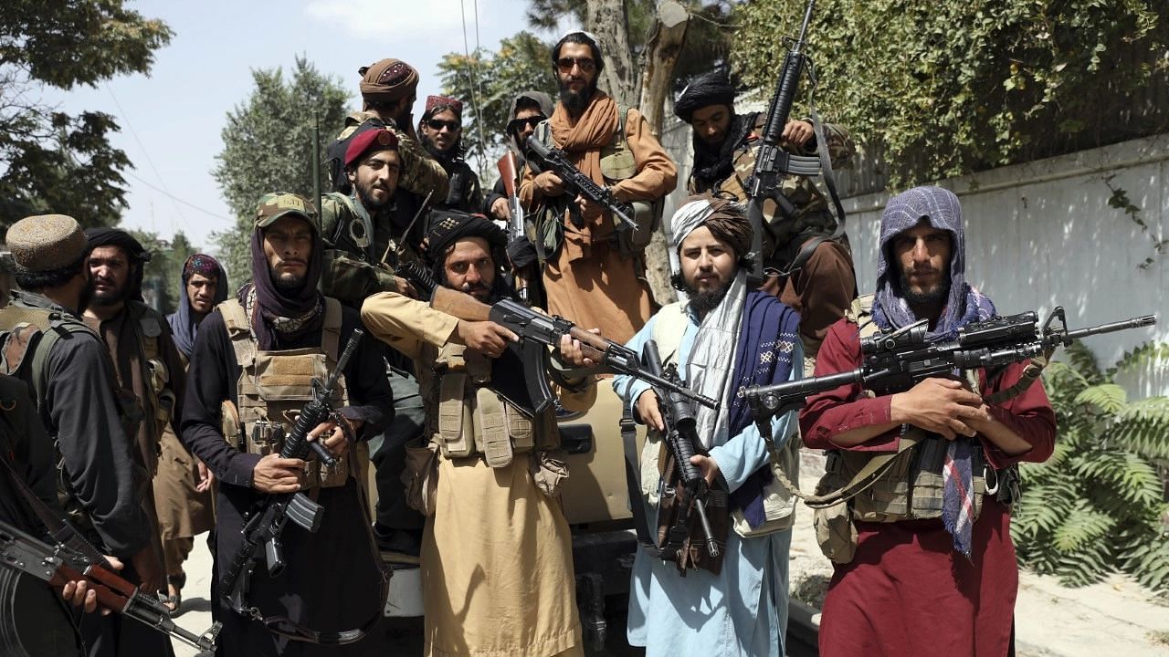 Taliban Fighters Parade Kabul Airport, Inspect 'Disabled' US Choppers