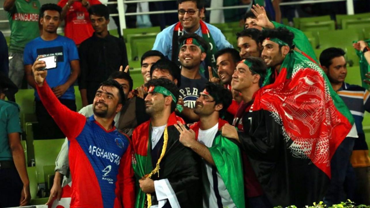 <div class="paragraphs"><p>Halcyon Days: Rashid Khan taking a selfie with his fans.</p></div>