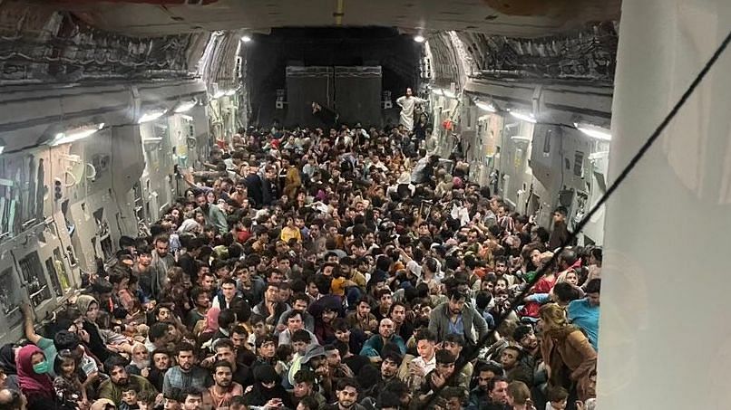 <div class="paragraphs"><p>A news website covering US security and defence published an image showing a sea of Afghans crammed against each other in a US Air Force C-17 Globemaster III as they flee Taliban rule.</p></div>