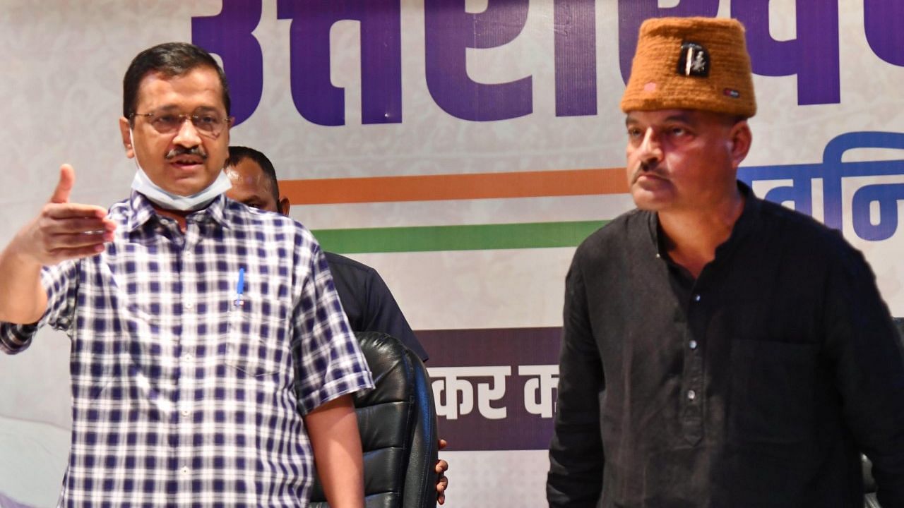 <div class="paragraphs"><p>Delhi CM Arvind Kejriwal with Aam Aadmi Party's chief ministerial candidate for Uttarakhand elections, retired Col Ajay Kothiyal, in Dehradun.</p></div>