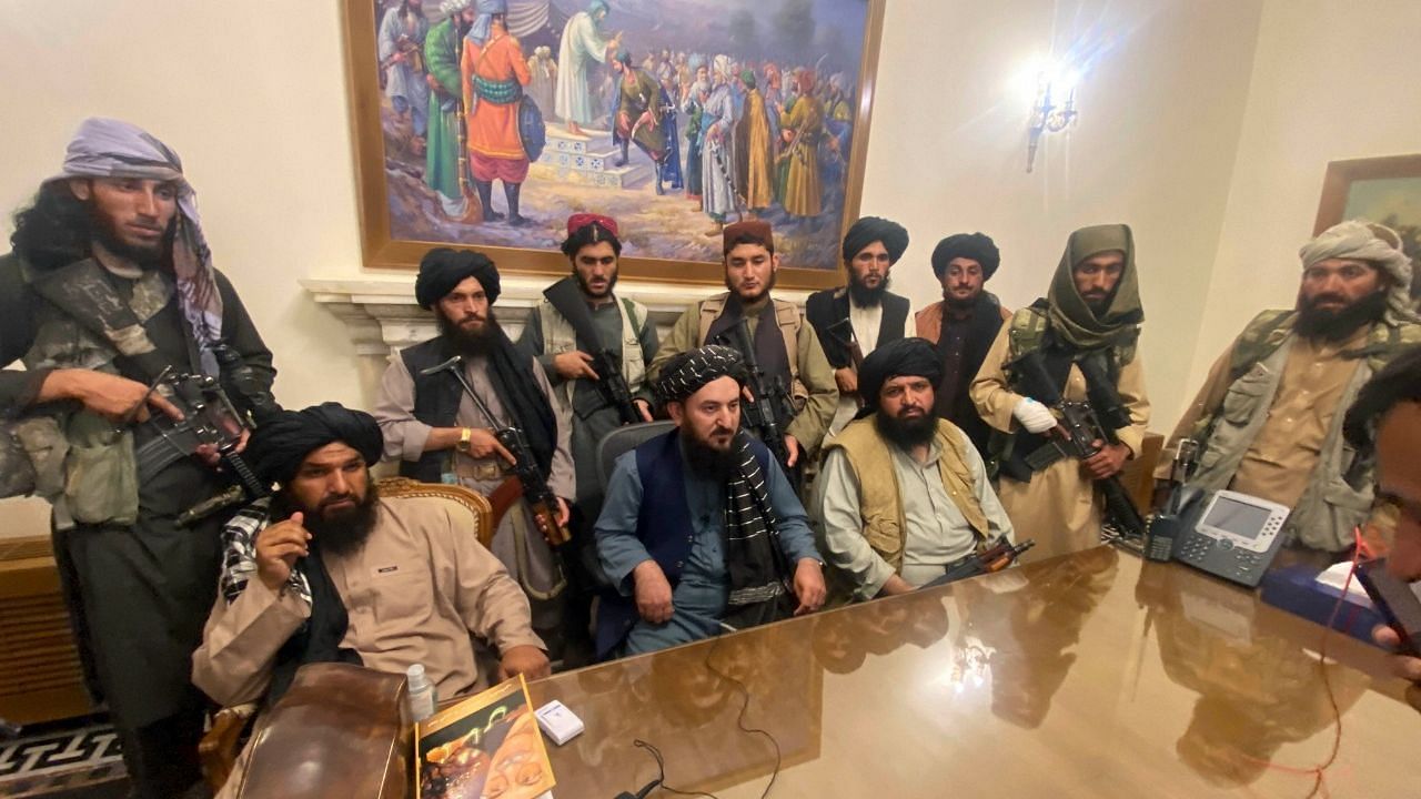 <div class="paragraphs"><p>Taliban fighters take control of Afghan presidential palace after the Afghan President Ashraf Ghani fled the country, in Kabul, Afghanistan, Sunday, Aug. 15, 2021.</p></div>