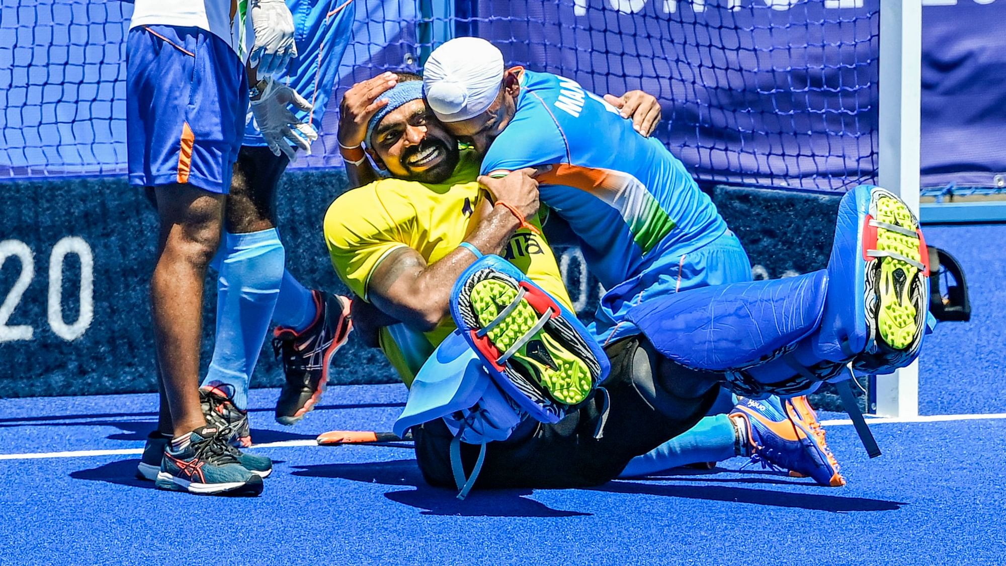<div class="paragraphs"><p>National Hero: PR Sreejesh celebrates with Mandeep Singh after India beat Germany 5-4 to win the Bronze medal after 49 years.&nbsp;</p></div>