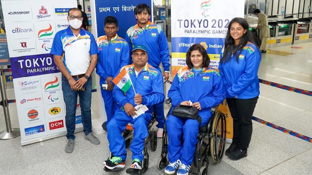 <div class="paragraphs"><p>Indian Paralympians and support staff pose for a photo at the Indira Gandhi International Airport in Delhi early on Wednesday morning.&nbsp;</p></div>