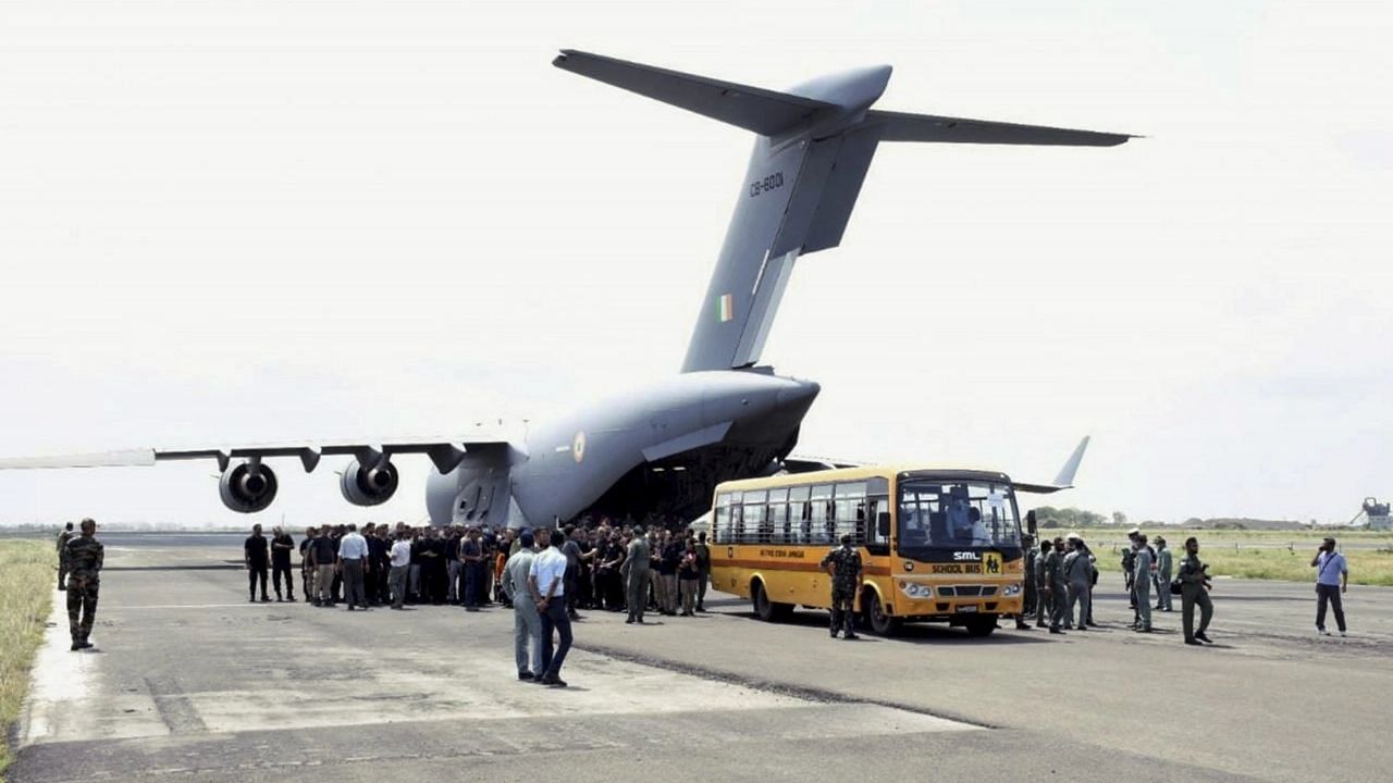 <div class="paragraphs"><p>Indian nationals on their arrival from crisis-hit Afghanistan by an Indian Air Forces C-17 aircraft, in Jamnagar.</p></div>