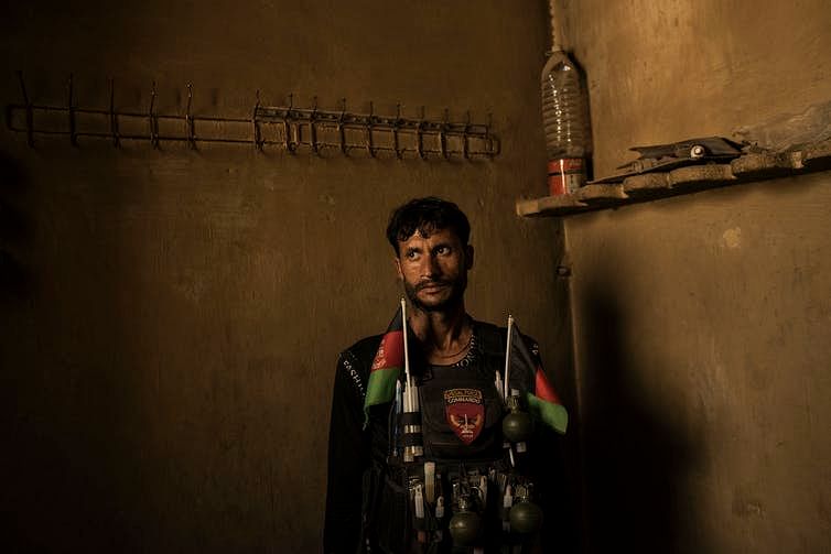 <div class="paragraphs"><p>An Afghan soldier surveys a former ISIS-K jail in Nangarhar province, eastern Afghanistan.</p></div>
