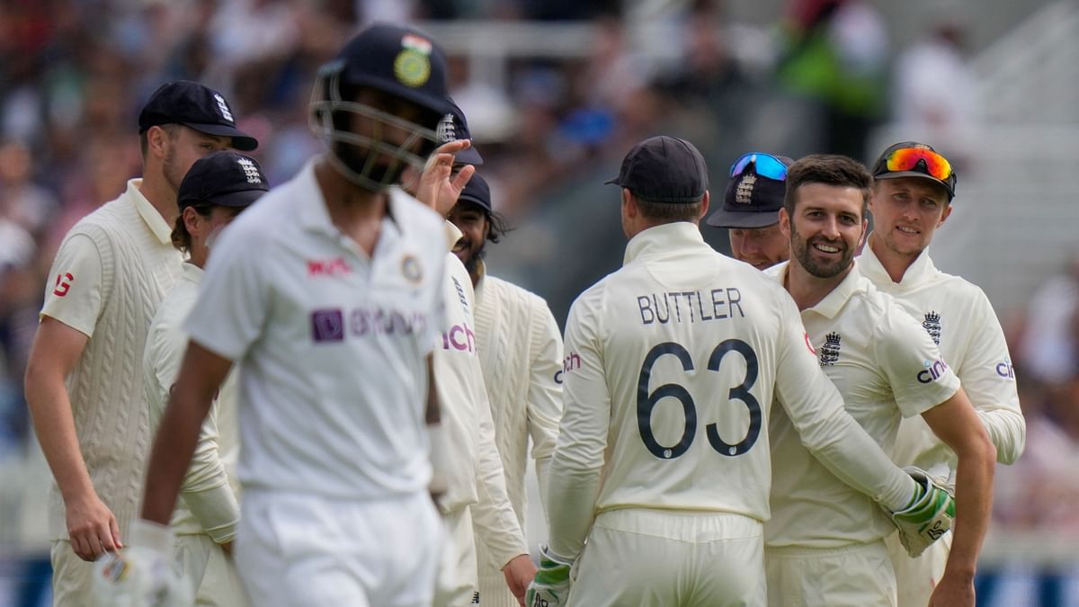 <div class="paragraphs"><p>Mark Wood celebrates with his teammates after dismissing India opener KL Rahul.</p></div>