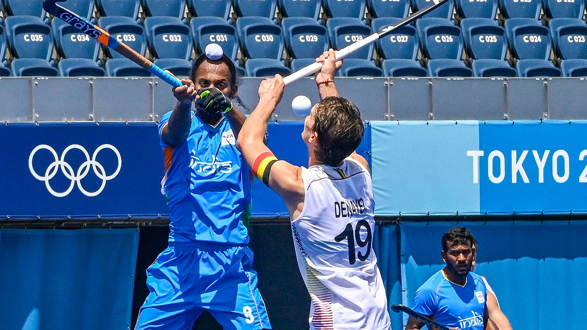 <div class="paragraphs"><p>Action during the India vs Belgium hockey match.</p></div>