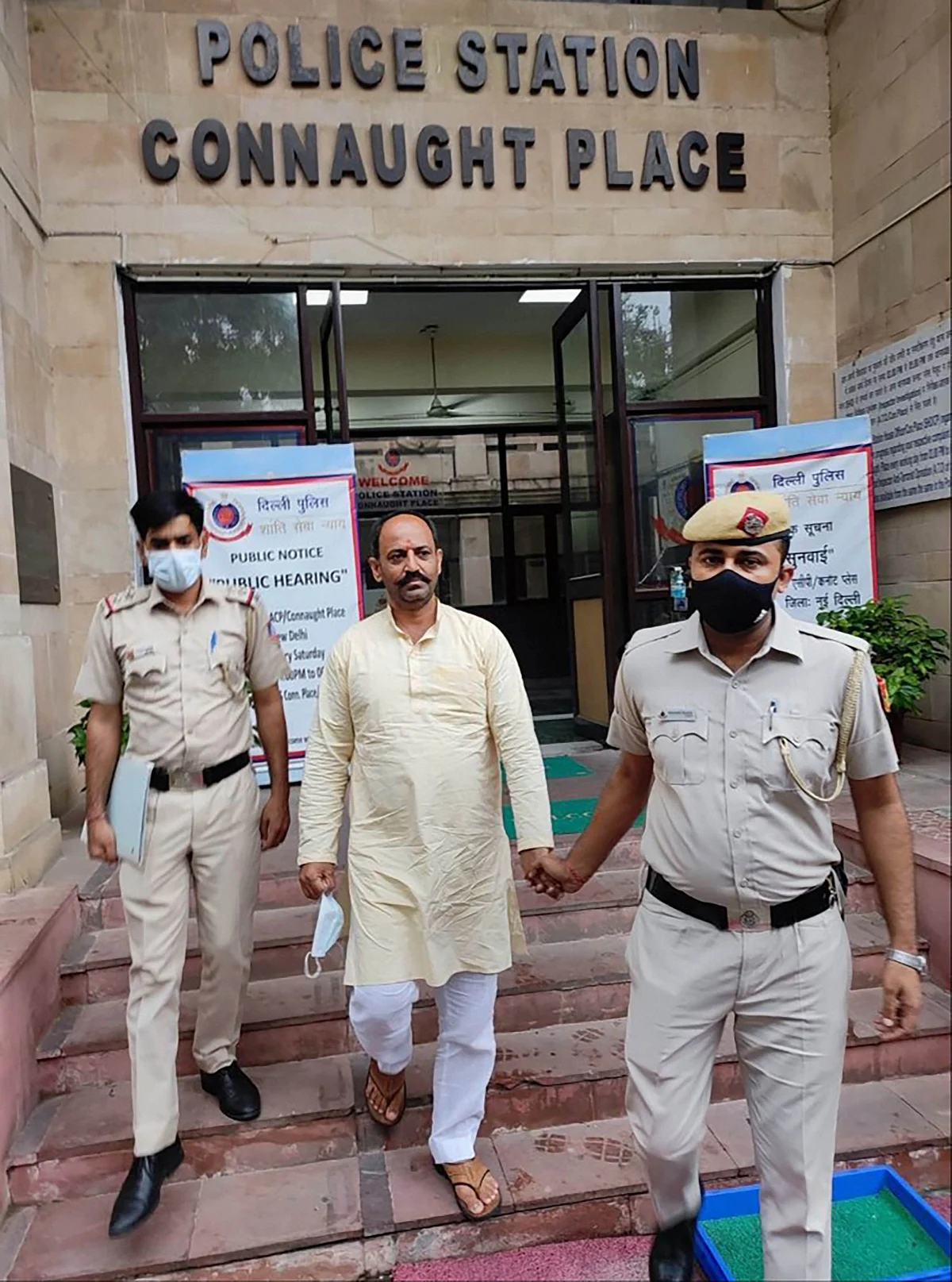 <div class="paragraphs"><p>New Delhi: Delhi Police personnel with Hindu Raksha Dal leader Pinki Chaudhary, arrested in connection with communal sloganeering at Jantar Mantar during a protest, in New Delhi<br></p></div>