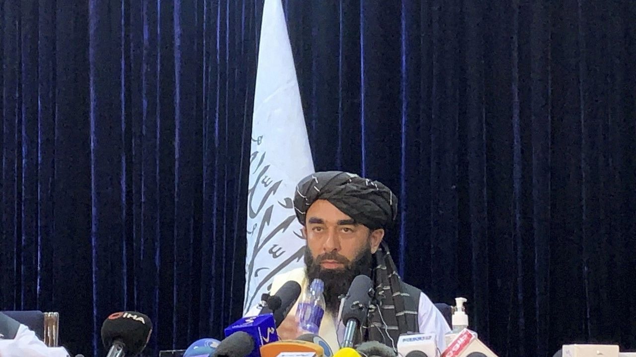 <div class="paragraphs"><p> Taliban spokesman Zabihullah Mujahid speaks at at his first news conference in Kabul, Afghanistan.</p></div>