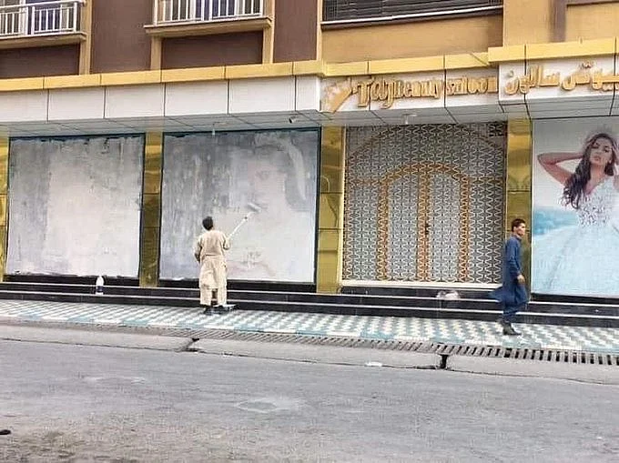 <div class="paragraphs"><p>Beauty salons covering up women's pictures in Afghanistan.</p></div>