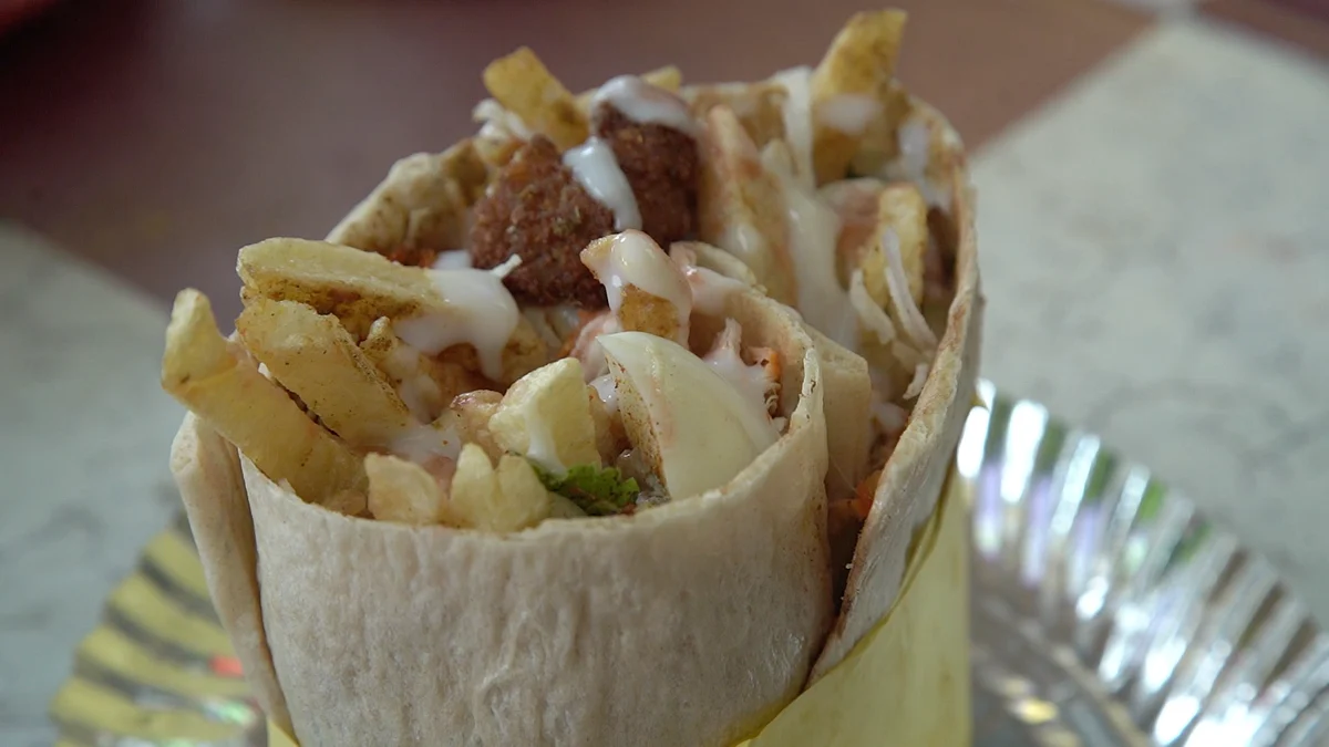 <div class="paragraphs"><p>Afghani Burger</p></div>
