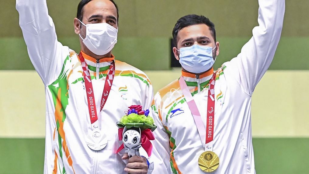 <div class="paragraphs"><p>Gold medallist Manish Narwal and silver medalist Sighraj Singh of India pose for photographs during the presentation ceremony of P4-Mixed 50m Pistol Shooting event at the Tokyo Paralympics 2020</p></div>