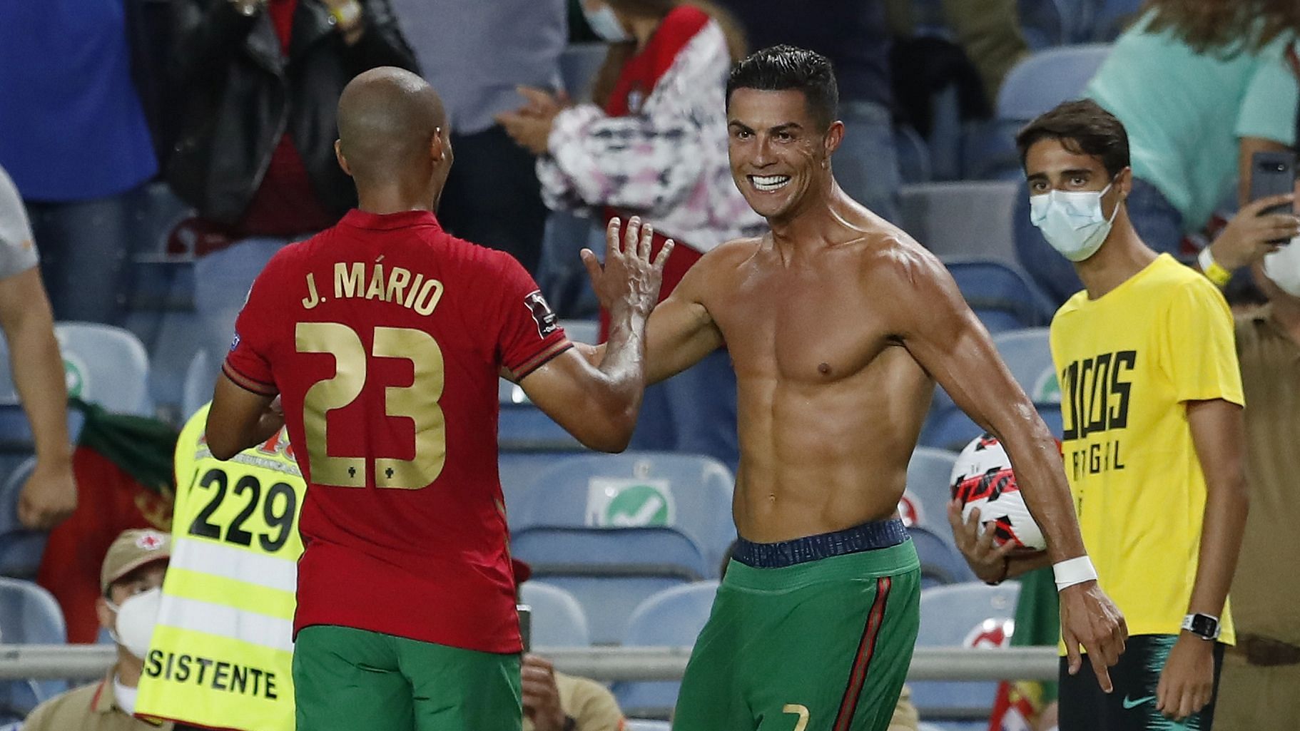 <div class="paragraphs"><p>Portugal's Cristiano Ronaldo, right, celebrates after scoring his side's second goal during the World Cup 2022 group A qualifying soccer match between Portugal and Ireland.</p></div>