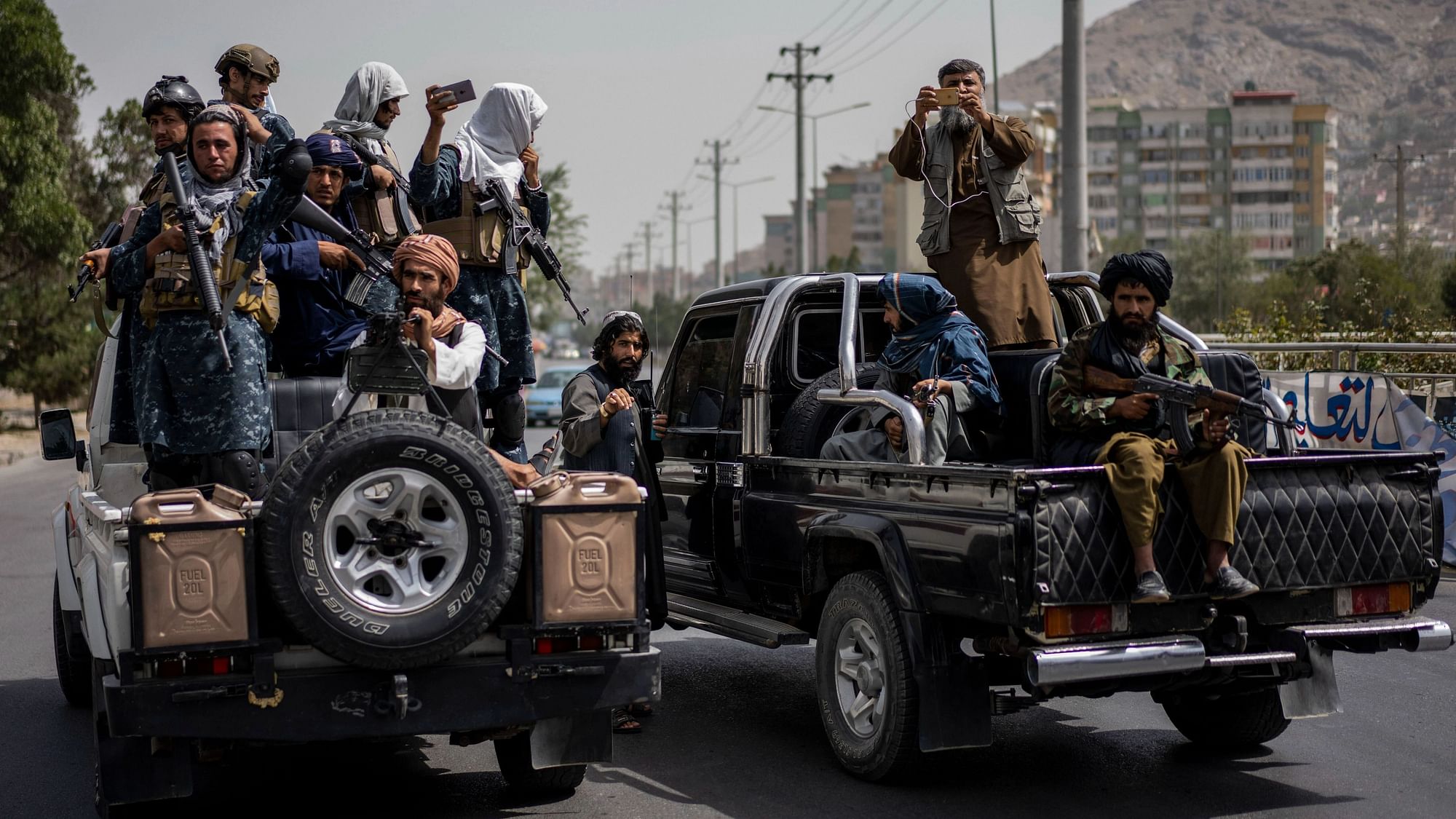 <div class="paragraphs"><p>Taliban fighters outside Kabul University on Saturday, 11 September. </p></div>
