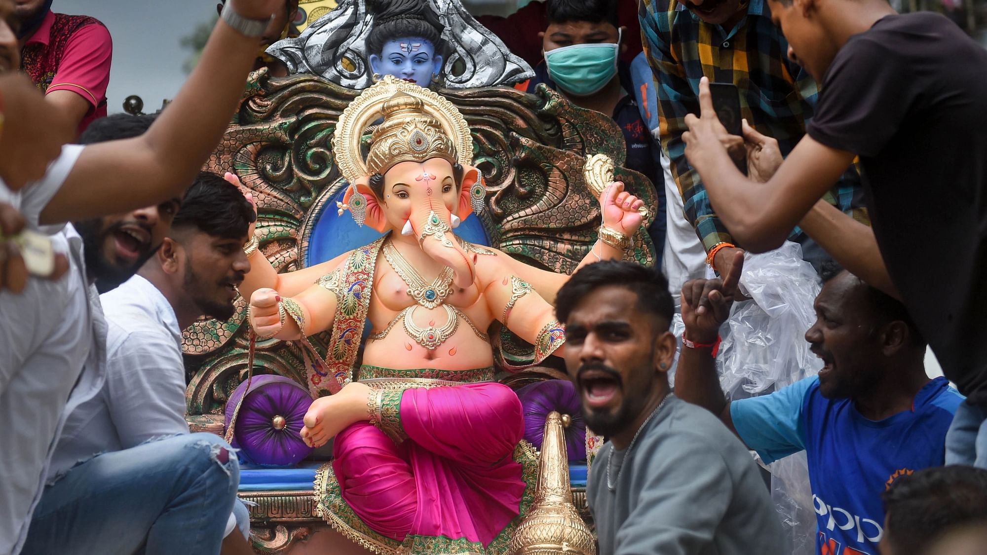 <div class="paragraphs"><p>Mumbai: Devotees carry an idol of Lord Ganesha to their homes on the occasion of Ganesh Chaturthi festival, 10 September.</p></div>