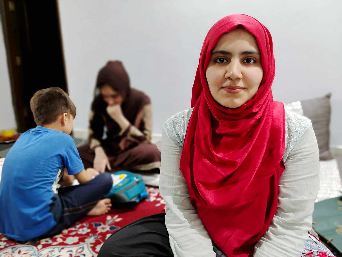 <div class="paragraphs"><p>Twenty-year-old Muzhda Qadir's lives with her two sisters, brother and mother. Her sister Adina is tutoring a neighbourhood kid in the background. This is one of their primary sources of income now.</p></div>