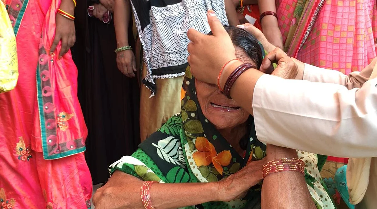 <div class="paragraphs"><p>People trying to console grieving grandmother of Vaishnavi who died on Tuesday</p></div>