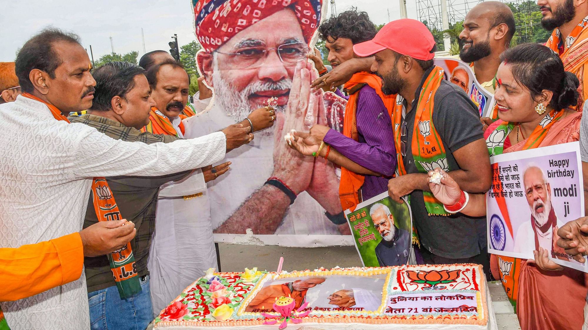 <div class="paragraphs"><p>BJP workers celebrate on the eve of Prime Minister Narendra Modi's birthday in Patna on Thursday.</p></div>
