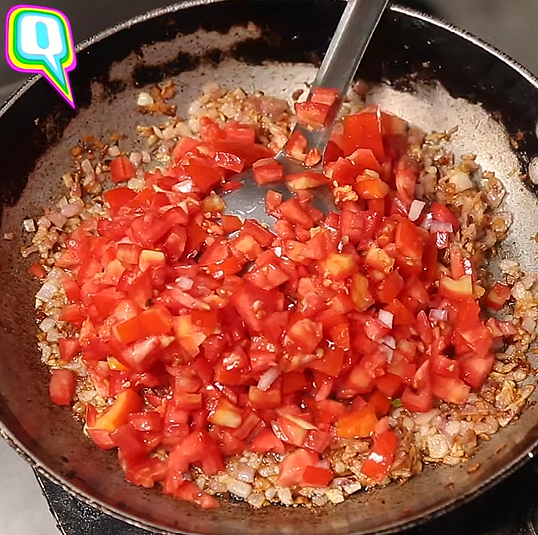 <div class="paragraphs"><p>After the onions are golden brown, add chopped tomatoes.</p></div>