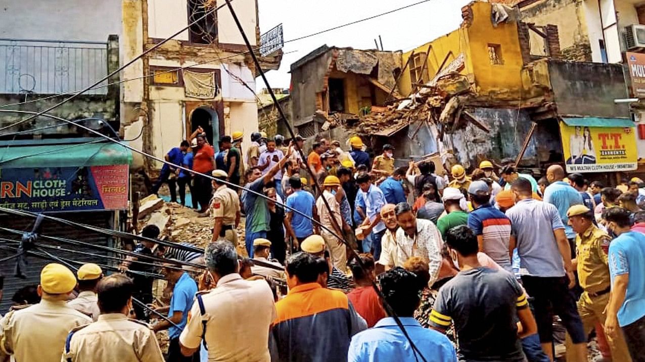 <div class="paragraphs"><p>A four-storey building in Delhi's Sabzi Mandi area collapsed on Monday, 13 September.</p></div>