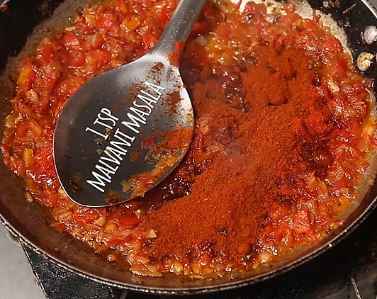 <div class="paragraphs"><p>Add Malvani Masala</p></div>