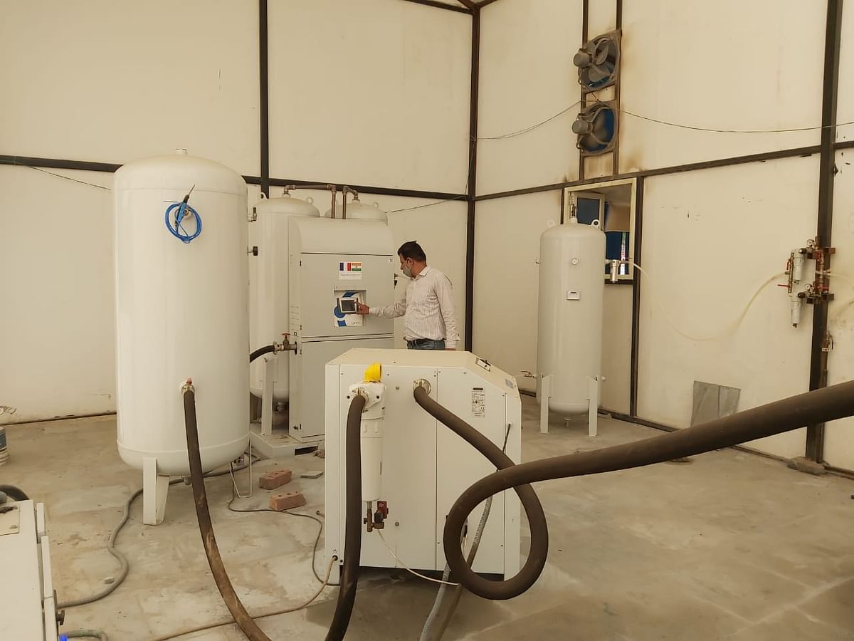 <div class="paragraphs"><p>A technician operating 330 LPM PSA Oxygen plant donated by France to India at Raja Harish Chandra Hospital.</p></div>
