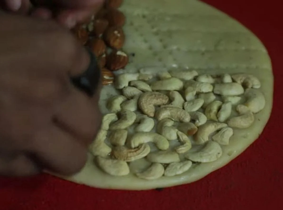 <div class="paragraphs"><p><strong>Add cashew nuts</strong></p></div>