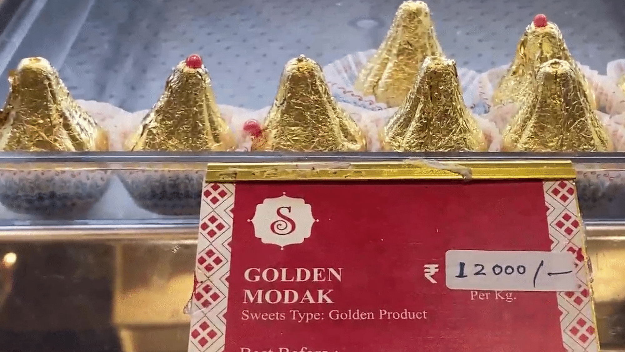 <div class="paragraphs"><p>Gold modaks at Sagar Sweets, Nashik for Rs 12,000 per kg.</p></div>