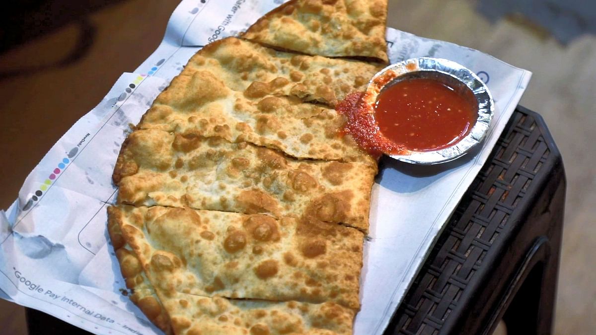 Try Afghani street food in the streets of Delhi.