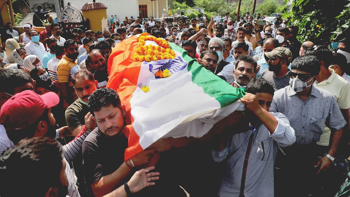 <div class="paragraphs"><p>Family members, relatives and locals carry the mortal remains of Deepak Chand, a teacher who was killed by militants on October 8 2021. </p></div>