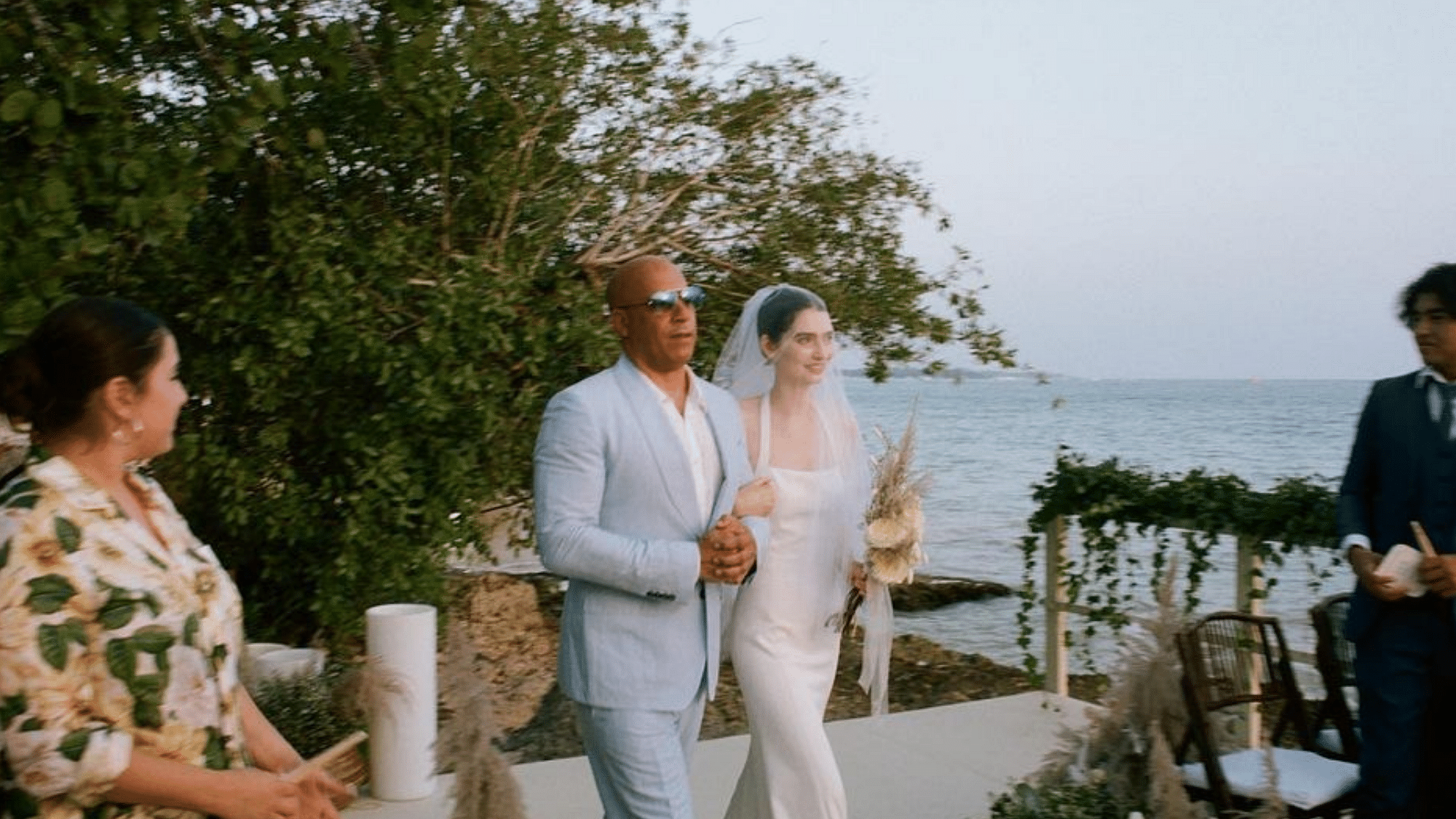 <div class="paragraphs"><p>Vin Diesel walking Paul Waker's daughter, Meadow, down the aisle at her wedding.</p></div>
