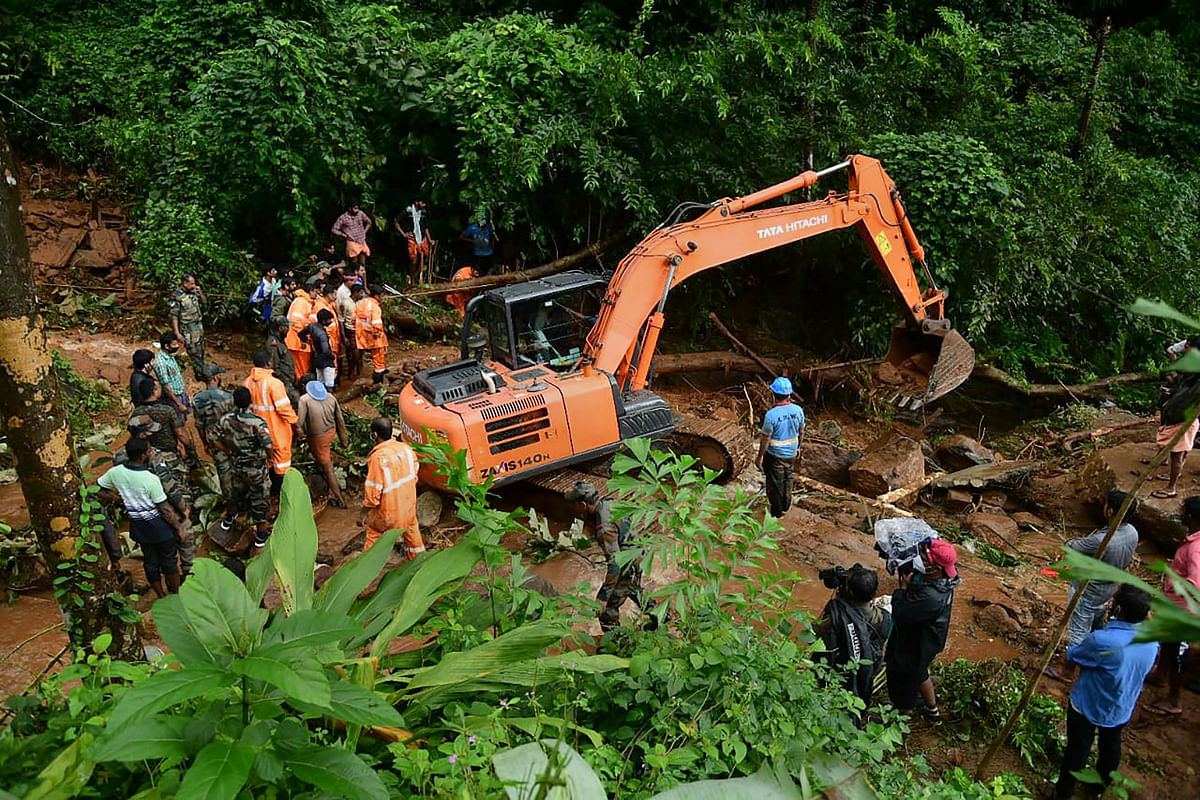 <div class="paragraphs"><p>Rapid Action Force (RAF) and Kerala Fire and Rescue personnel during rescue operations at the site of landslide at Kavali in Kottayam district, Sunday, 17 October, 2021.</p></div>