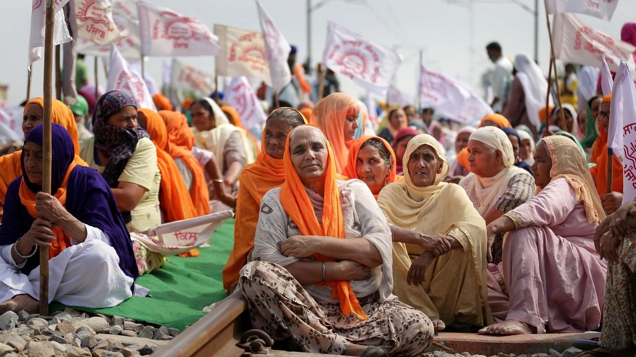<div class="paragraphs"><p>Amritsar: Farmers block railway tracks as part of the Samyukt Kisan Morchas rail roko protest demanding the dismissal and arrest of Union Minister Ajay Misra in connection with the Lakhimpur Kheri unrest, at Devi Dass Pura in Amritsar district.</p></div>