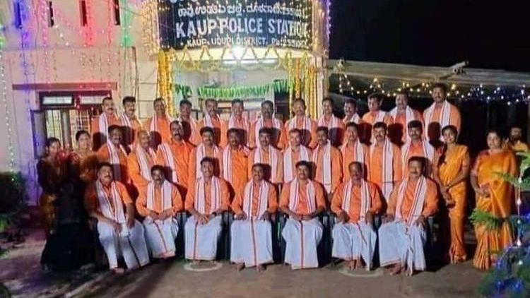 <div class="paragraphs"><p>Photos of Karnataka cops dressed in saffron for Dasara celebration.</p></div>