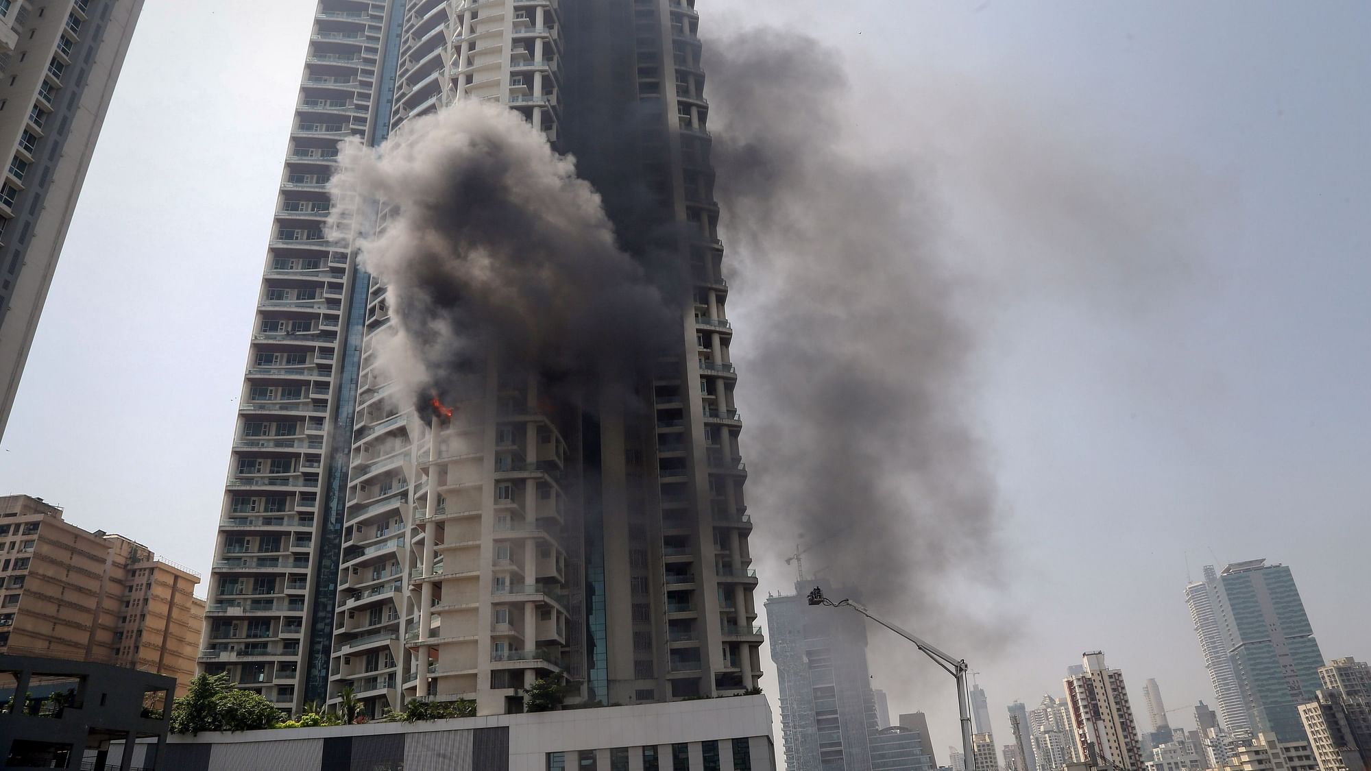 <div class="paragraphs"><p>Mumbai: Fire tenders carry out a rescue operation after a fire broke out at a multi-story residential building near the Lalbaug area in Parel, Mumbai, on Friday, 22 October.</p></div>