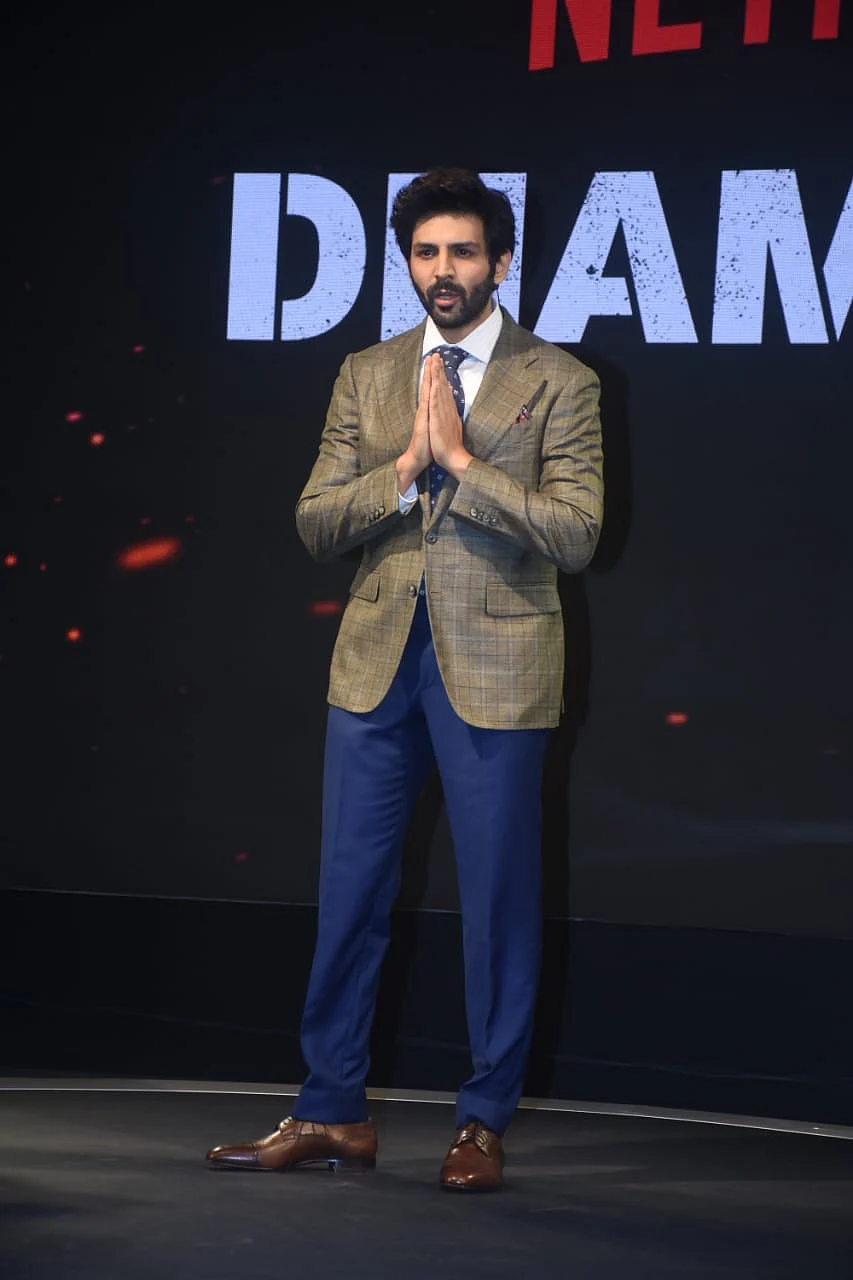 <div class="paragraphs"><p>Kartik Aaryan plays a journalist in Netflix's <em>Dhamaka.</em></p></div>