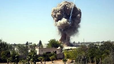 <div class="paragraphs"><p>Smoke rising from a bomb blast site in Syria. Image used for representational purposes only.&nbsp;</p></div>