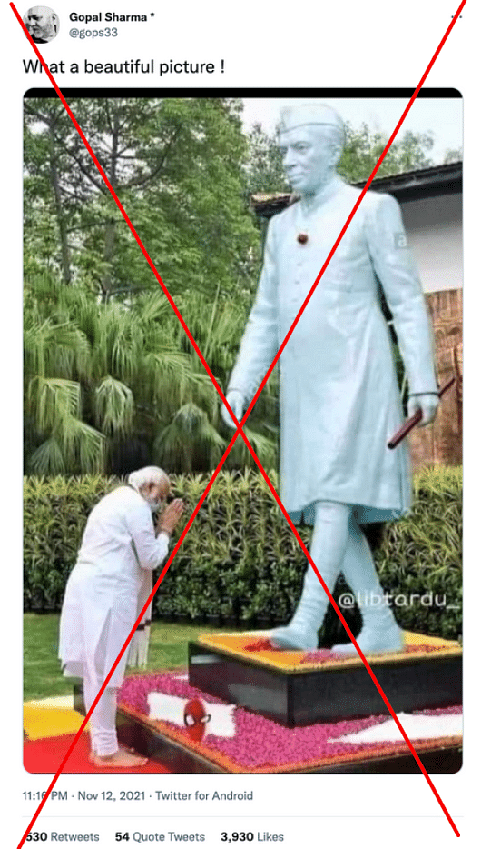 In the original photo, PM Modi can be seen bowing down before the statue of Mahatma Gandhi. 